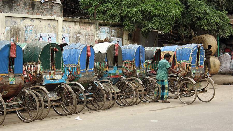 Dhaka rickshaw market scene